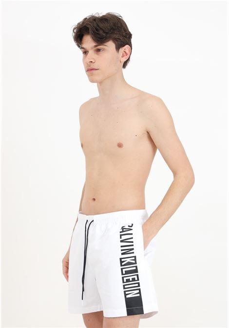 White men's swim shorts with maxi logo print CALVIN KLEIN | KM0KM00991YCD
